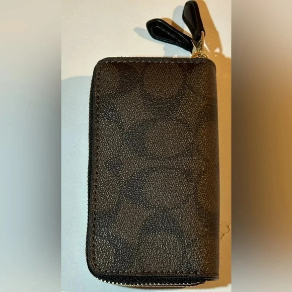 A Coach zip around mini sig. canvas wallet. - Picture 2 of 9